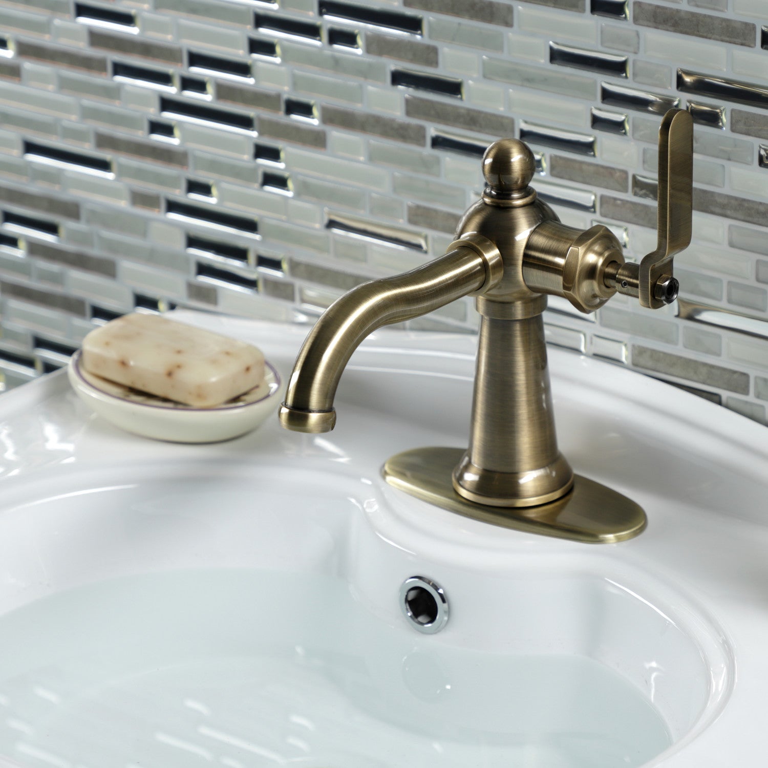 Kingston Tulare KSD3543KL - Knight One-Handle 1-Hole Bathroom Faucet with Deck Plate and Push Pop-Up Drain, Antique Brass — thumbnail 2